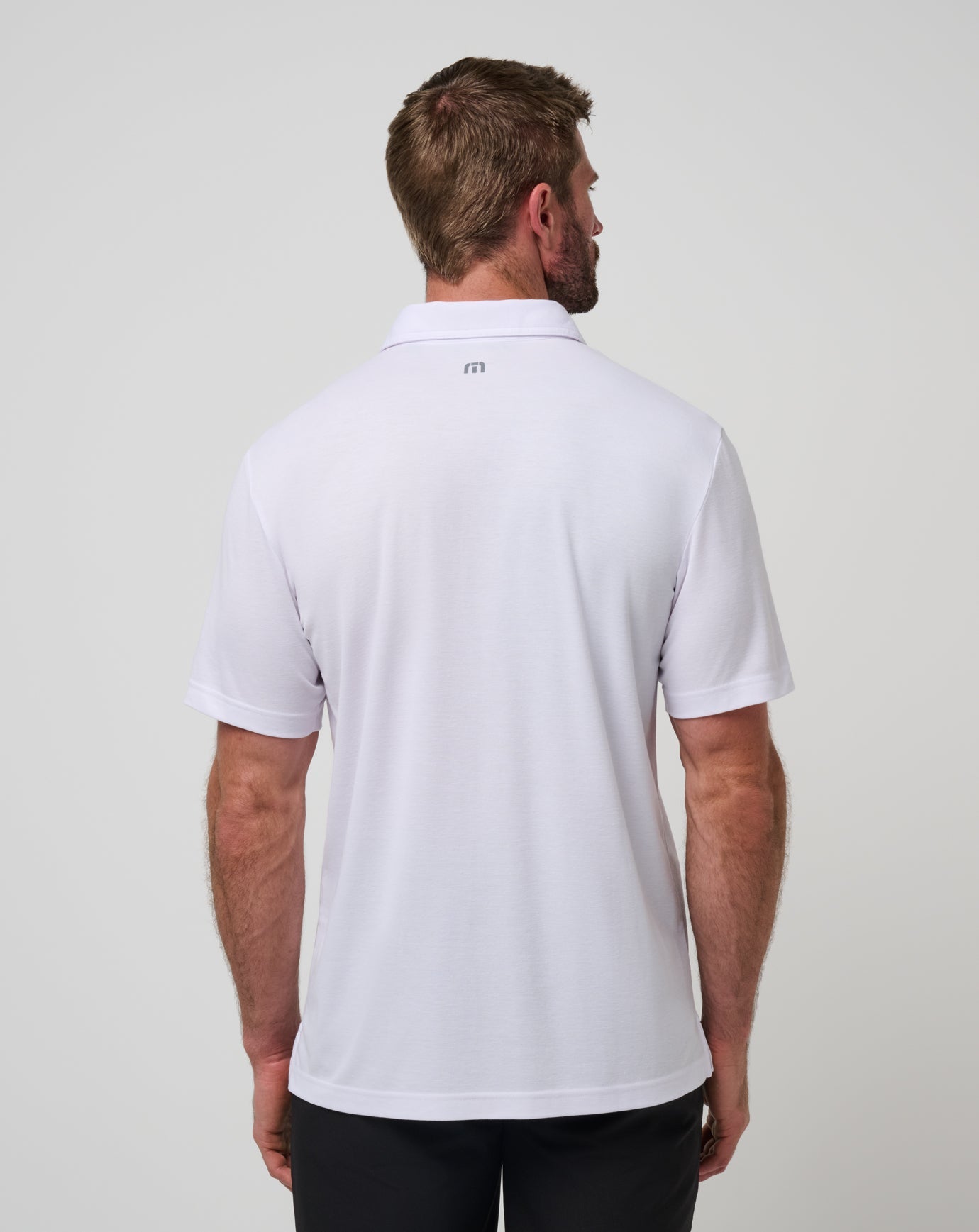 Travis Mathew New | Nebraska Top Recruit Polo