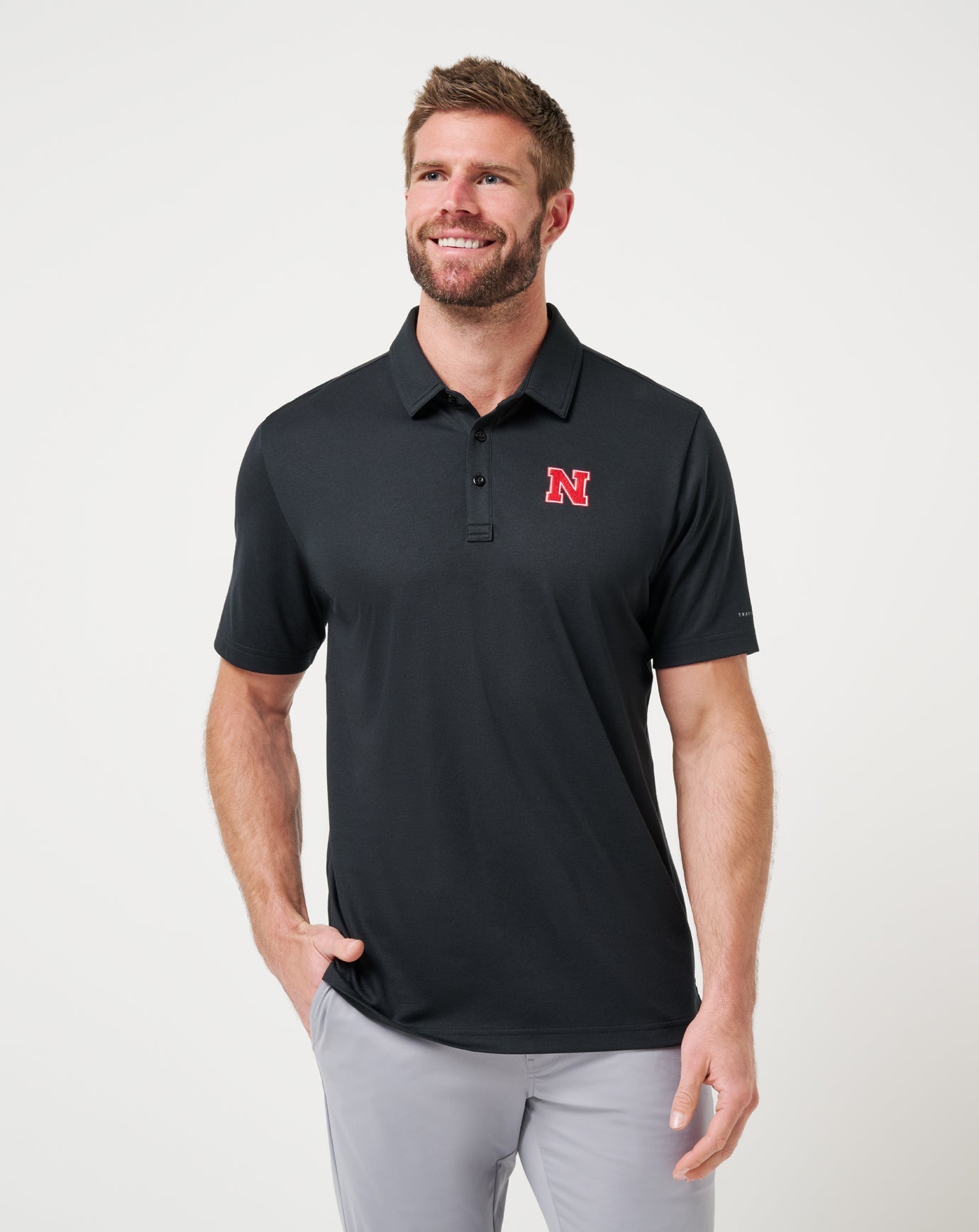 Travis Mathew Hot sale | Nebraska School Pride Polo