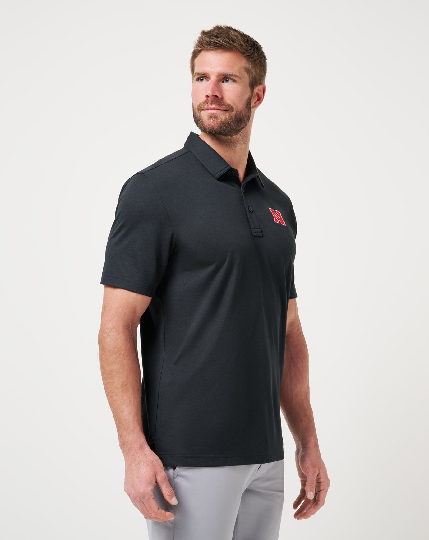 Travis Mathew Hot sale | Nebraska School Pride Polo