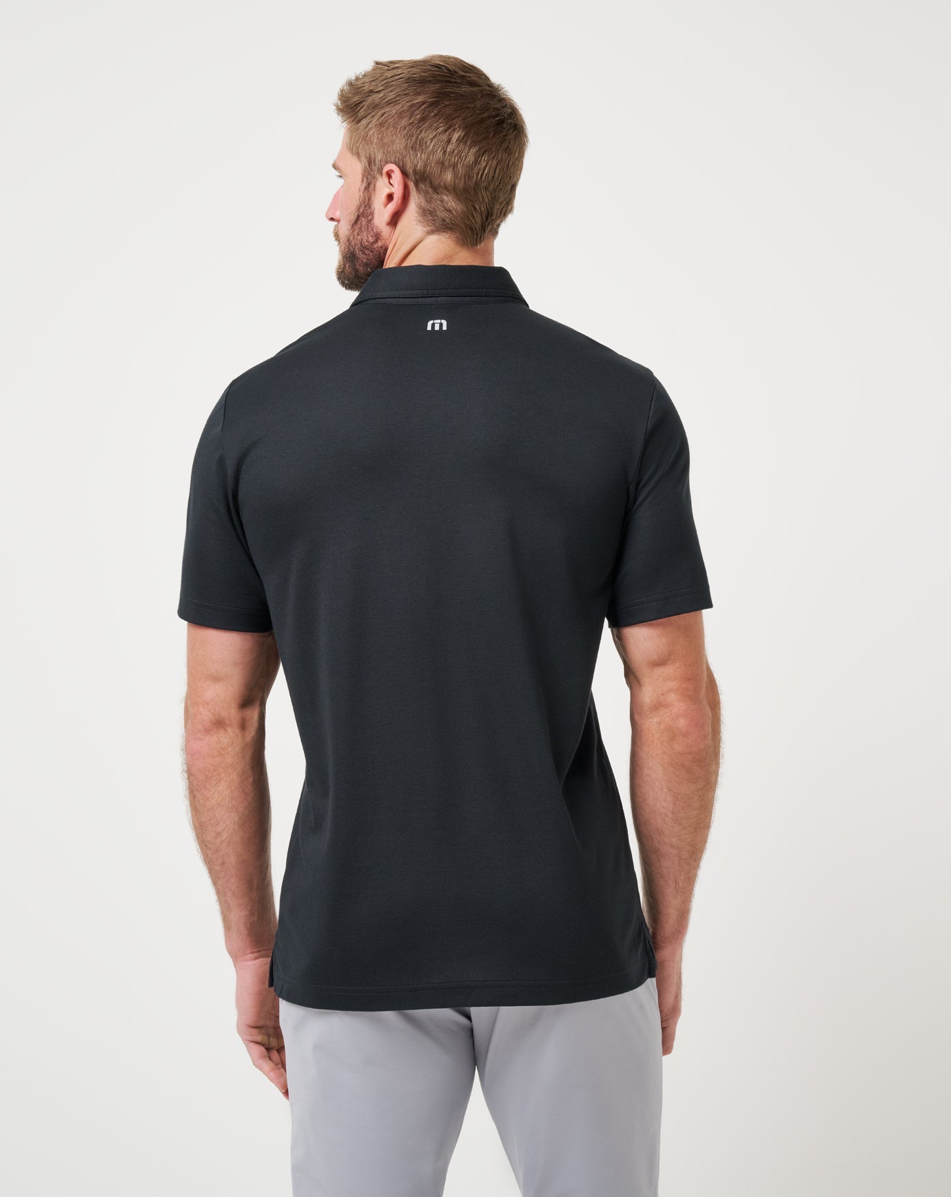 Travis Mathew Hot sale | Nebraska School Pride Polo