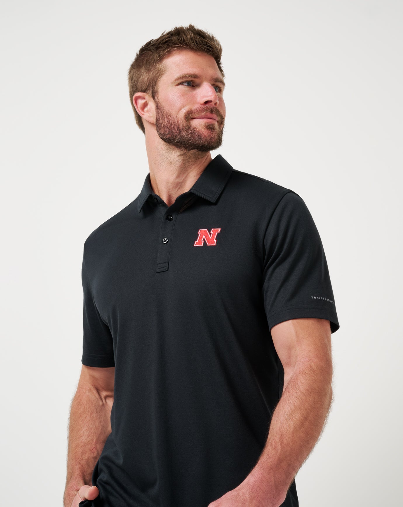 Travis Mathew Hot sale | Nebraska School Pride Polo