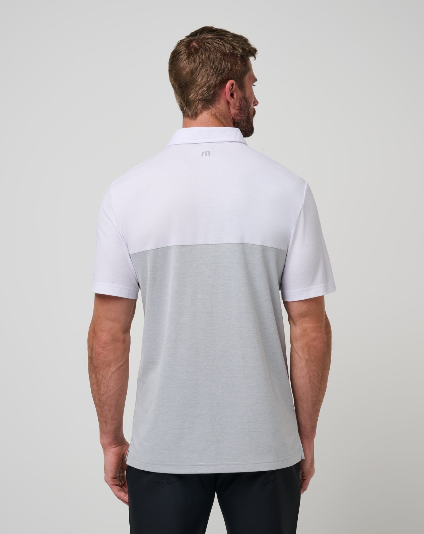 Travis Mathew Discount | UT Austin Drop Back Polo
